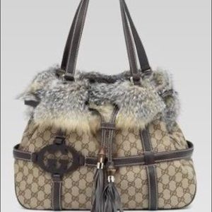 100% authentic Gucci fox fur trim monogram shoulder bag